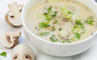 Mushroom soup with melted cheese